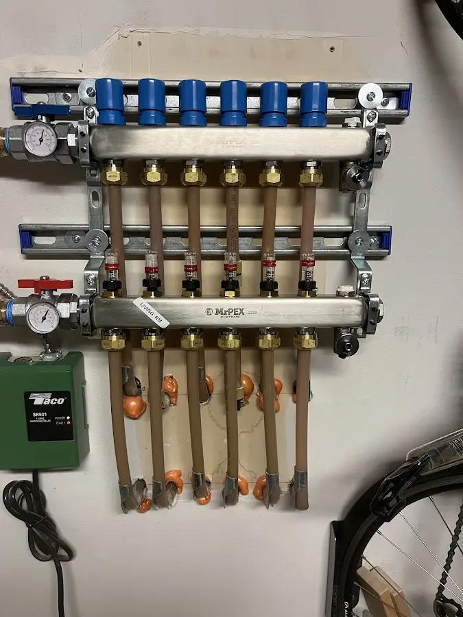 Plumber performing Water Heater Repair at a residential property in Wanaque